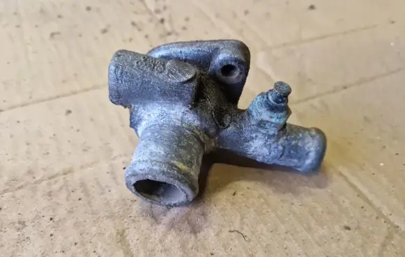 Volkswagen Golf I Engine coolant pipe/hose 049121145B