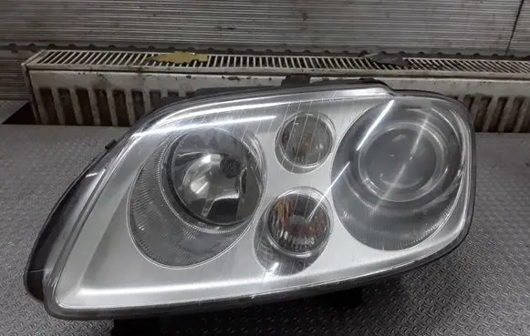 Volkswagen Touran I Headlight/headlamp 1T0941031F