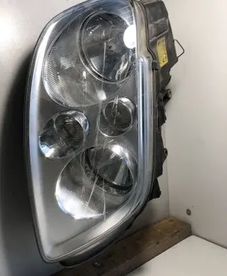 Volkswagen Touran I Headlight/headlamp 1T0941006R