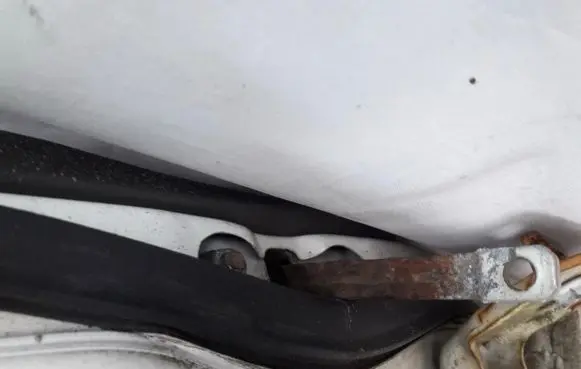Mazda 626 Rear door check strap stopper
