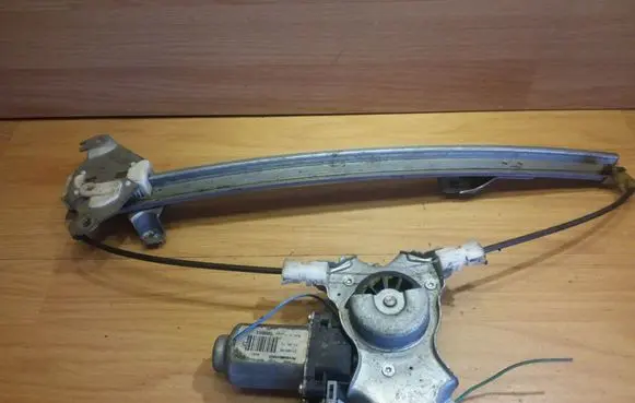 Nissan Primera Rear door window regulator with motor 400601