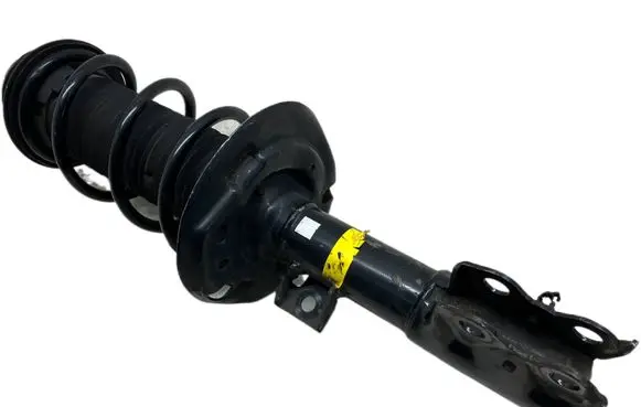 Toyota Yaris XP210 Front shock absorber with coil spring