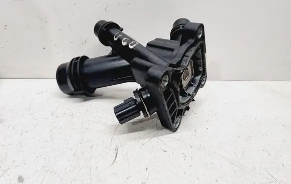 Thermostat/thermostat housing