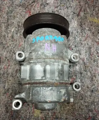 KIA Sportage Air conditioning (A/C) compressor (pump) 97701D7300
