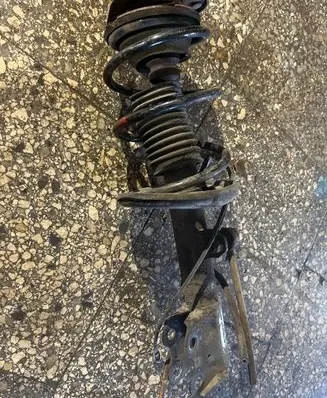 Toyota Corolla E120 E130 Front shock absorber with coil spring 4852047061