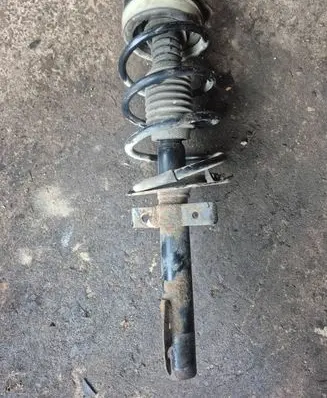 Renault Megane II Front shock absorber with coil spring