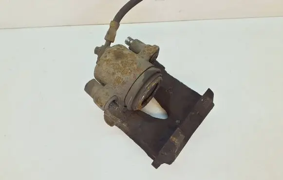 Volkswagen Golf VI Front brake caliper