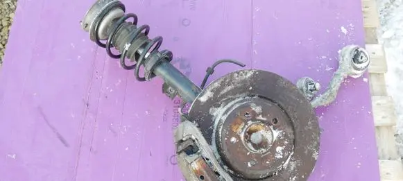 Front shock absorber with coil spring