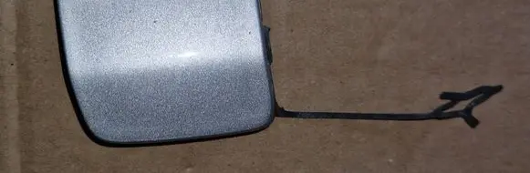 Dacia Spring Front tow hook cap/cover 