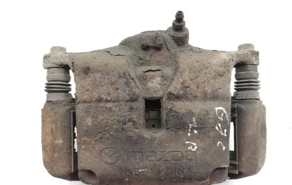 Mazda 3 II Front brake caliper