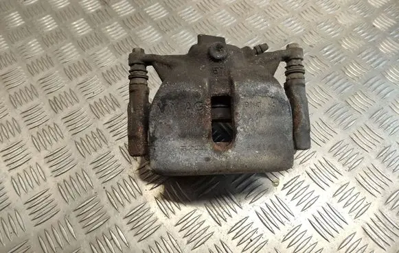 Volkswagen Golf VII Front brake caliper