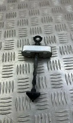 Mazda 6 Rear door check strap stopper