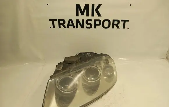 Volkswagen Touareg I Headlight/headlamp 7L6941015BK 89307851 1302A5394