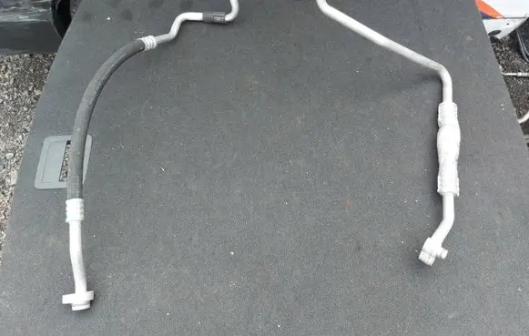 Volkswagen Golf VI Air conditioning (A/C) pipe/hose 1K0820743FD