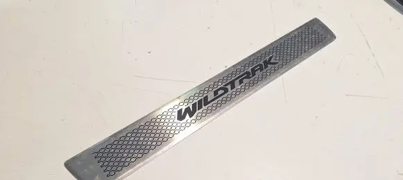 Front sill trim cover