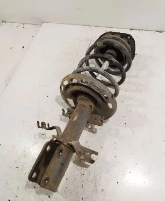 Renault Megane III Front shock absorber with coil spring