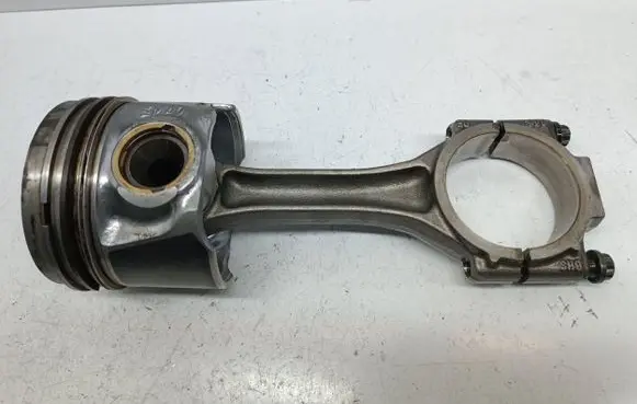 Piston with connecting rod