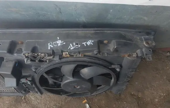 Radiator support slam panel