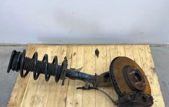 Front shock absorber with coil spring