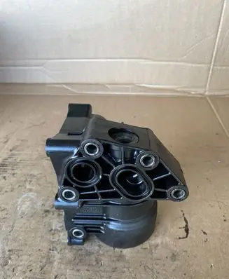 Hyundai Santa Fe Oil filter mounting bracket 264002F600