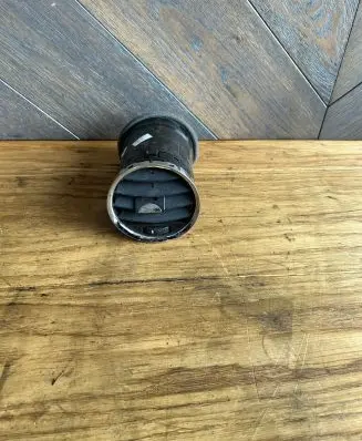 Dash center air vent grill