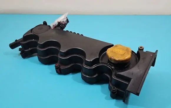 Rocker cam cover