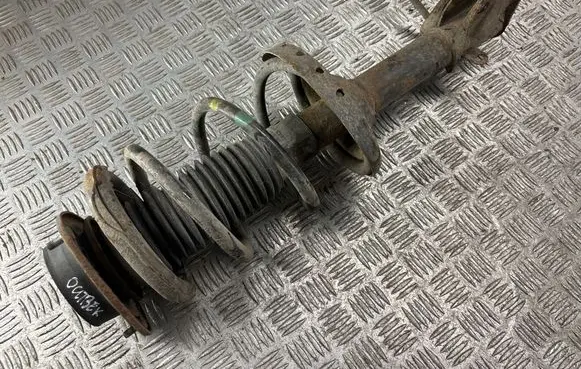 Subaru Outback Front shock absorber with coil spring