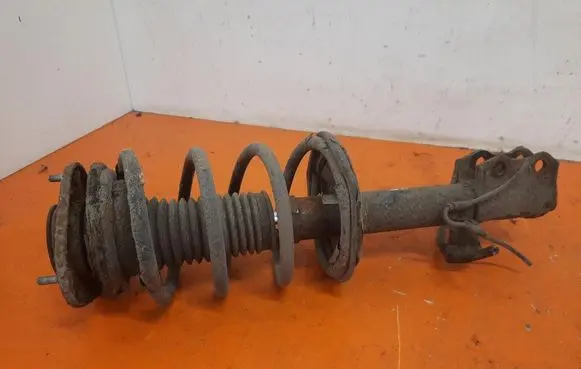 Toyota Corolla E110 Front shock absorber with coil spring