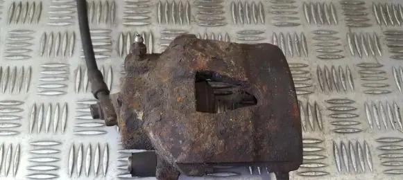 Volkswagen Golf IV Front brake caliper