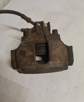 Volvo V70 Front brake caliper 9209723