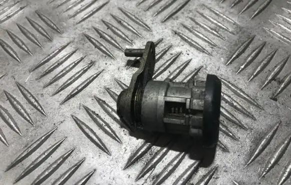 Ford Escort Front door lock (next to the handle) 