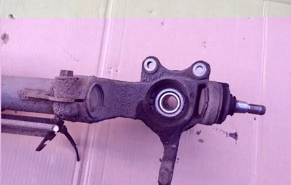 Front wheel hub spindle knuckle