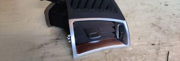 Cadillac SRX Dashboard side air vent grill/cover trim 15894314