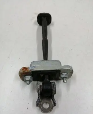 Front door check strap stopper