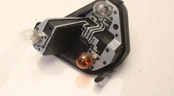 Renault Clio III Tail light bulb cover holder 