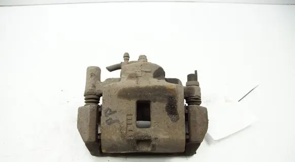 Mazda 323 F Front brake caliper