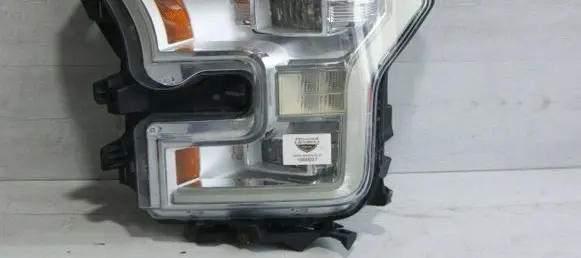 Ford F150 Headlight/headlamp dust cover GL23A