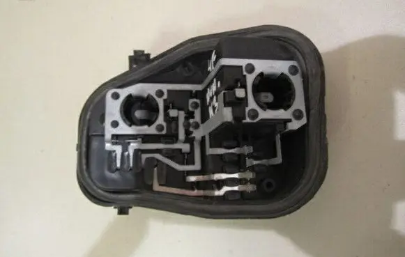 Tail light bulb cover holder