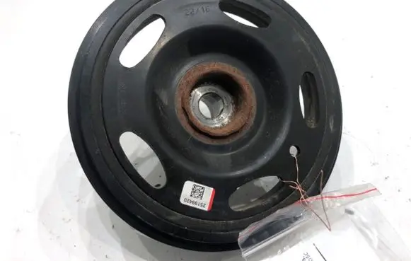 Opel Corsa E Timing belt tensioner pulley 25199420