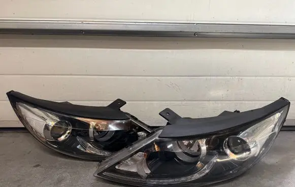KIA Sportage Headlights/headlamps set 921013U250 921023U250