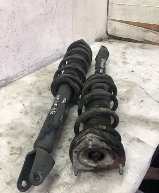 Infiniti Q50 Front shock absorber with coil spring 561104gd0b