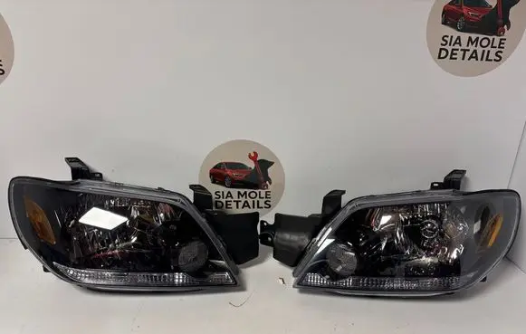 Mitsubishi Outlander Headlights/headlamps set MN150492 21411A4RLD2 00021411A4