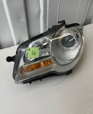 Volkswagen Touran I Headlight/headlamp 0301233201 1T1941005B