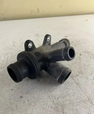 Thermostat/thermostat housing