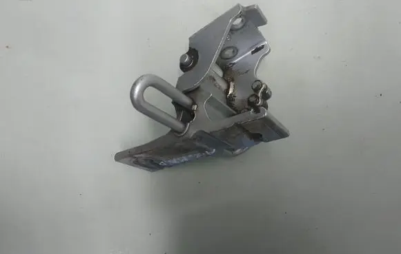 Front door lower hinge