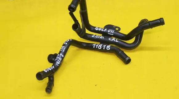 Volkswagen Golf VII Engine coolant pipe/hose 04L121064AF
