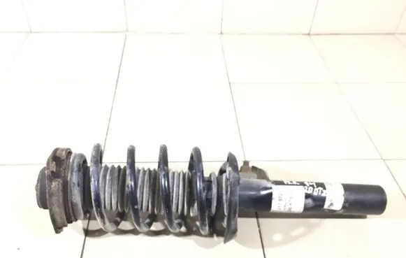Volkswagen Touran I Front shock absorber with coil spring 317572 824904013017