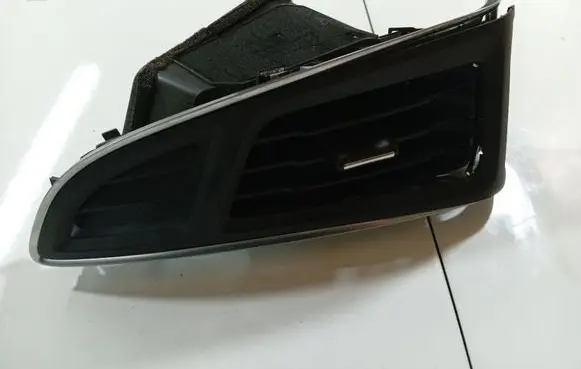 Dash center air vent grill