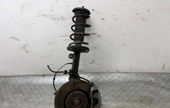 Front shock absorber with coil spring