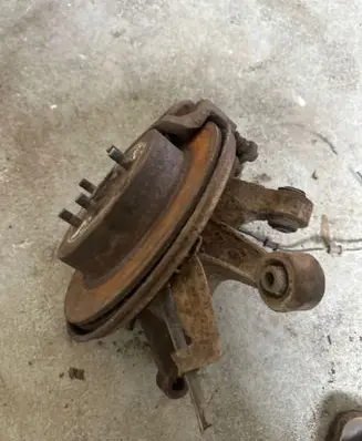 Rear wheel hub spindle/knuckle
